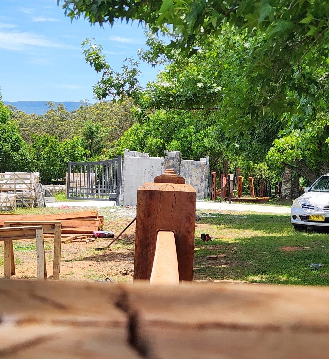 Timber post with three rails let into the face